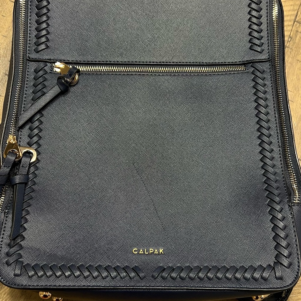 NWOT Calpak Navy Backpack with Gold Accents